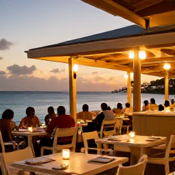Caribbean Holidays, October Holidays, A relaxed seaside restaurant in Sint Maarten at sunset, with outdoor tables, warm lights and diners overlooking the Caribbean