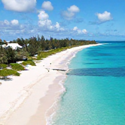 Caribbean Holidays, October Instagram Spots, Aerial view of Grace Bay Beach in Turks and Caicos with bright turquoise water, white sand and a calm October sky