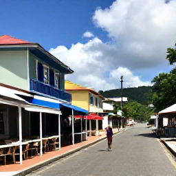 Caribbean Holidays, October Solo Holidays, A colourful street in Basseterre, Saint Kitts, with historic buildings, local caf&eacute;s and a solo visitor exploring the town
