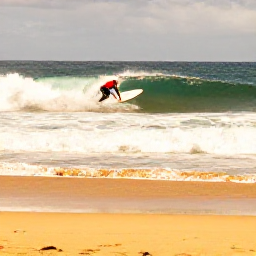 Caribbean Holidays, Puerto Rico Adventure, A surfer riding a clean wave beside a golden beach in Rincon, Puerto Rico, under a warm March sky
