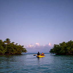 Caribbean Holidays, Puerto Rico Adventures, Travellers kayaking through calm turquoise water in Puerto Rico&rsquo;s bioluminescent bay at dusk, mangroves along the shore and stars above