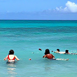 Caribbean Holidays, Puerto Rico Beaches, Visitors enjoying calm turquoise water and colourful fish while snorkelling near Puerto Rico