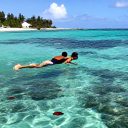 Caribbean Holidays, Puerto Rico Beaches, Visitors snorkelling in clear Caribbean water near Puerto Rico, colourful fish, coral reef and sunny coastline