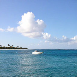 Caribbean Holidays, Puerto Rico Diving, Small dive boat travelling across calm turquoise water towards Puerto Rico's tropical coastline on a sunny January morning