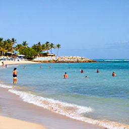 Caribbean Holidays, Puerto Rico February, Puerto Rican coastline with palm-fringed beach, clear Caribbean water and visitors enjoying swimming and gentle watersports in February