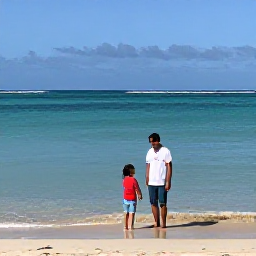 Caribbean Holidays, Puerto Rico Fly Drive, Puerto Rican family enjoying a beautiful beach beside calm turquoise water in July sunshine