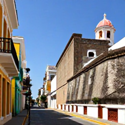 Caribbean Holidays, Puerto Rico Holidays, Colourful colonial streets and historic fortifications in Old San Juan, Puerto Rico, in warm May sunshine