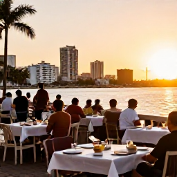Caribbean Holidays, Puerto Rico June, Golden evening light over San Juan waterfront with outdoor tables, local food and a lively Caribbean atmosphere