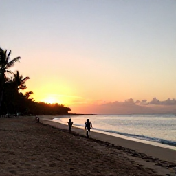 Caribbean Holidays, Puerto Rico Walking, A peaceful Puerto Rican beach at sunset, with walkers on the sand, calm Caribbean water and warm evening light