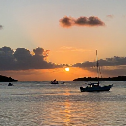 Caribbean Holidays, Saint Barth Fishing, Sunset over Gustavia harbour in Saint Barth&eacute;lemy after a day of fishing, with boats on calm water and warm evening light
