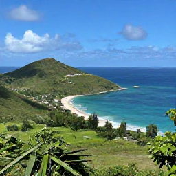 Caribbean Holidays, Saint Barthelemy Instagram Hotspots, A scenic viewpoint above Colombier Beach in Saint Barthelemy, showing a green hillside, sweeping turquoise bay and distant boats