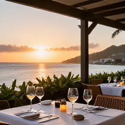 Caribbean Holidays, Saint Barthelemy Wine, Elegant Saint Barth&eacute;lemy restaurant terrace at sunset, wine glasses and Caribbean sea views