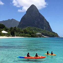 Caribbean Holidays, Saint Lucia Adventures, Kayakers and snorkellers enjoying clear Caribbean water beside Saint Lucia's green coastline