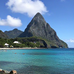 Caribbean Holidays, Saint Lucia Adventures, Kayakers and snorkellers exploring clear turquoise water beside Saint Lucia's volcanic coastline