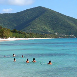 Caribbean Holidays, Saint Vincent Beaches, Travellers swimming and snorkelling in clear Caribbean water beside a sheltered Saint Vincent beach, with lush green hills in the background