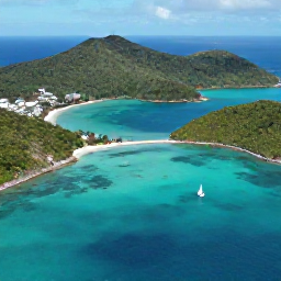 Caribbean Holidays, September Adventures, Aerial photograph of the British Virgin Islands in September, showing turquoise water, green hills and small sailing boats around Tortola