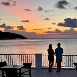 Caribbean Holidays, September Escapes, Couple watching a vivid Caribbean sunset from a terrace in Saint Barth&eacute;lemy, with calm sea and warm evening light