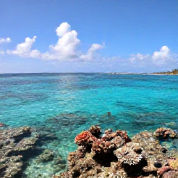 Caribbean Holidays, September Family Holidays, Family snorkelling in clear shallow Caribbean water near a colourful coral reef, sunny sky and small tropical fish