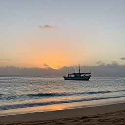 Caribbean Holidays, September Fishing, A quiet Cura&ccedil;ao beach at sunset with a fishing boat returning to shore