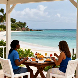 Caribbean Holidays, September Honeymoons, Romantic beachfront hotel terrace with breakfast for two overlooking the sea in Tobago