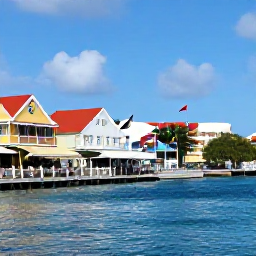 Caribbean Holidays, September Instagram Spots, Colourful waterfront buildings and caf&eacute;s along Front Street in Philipsburg, Sint Maarten, with Caribbean flags and calm blue water