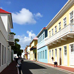 Caribbean Holidays, September Solo Holidays, A solo visitor walking through the colourful historic streets of Charlotte Amalie in St Thomas, with pastel buildings, balconies and Caribbean sunlight