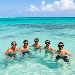 Caribbean Holidays, September Weddings, Happy wedding guests snorkelling in clear turquoise water near Providenciales, Turks and Caicos
