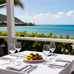 Caribbean Holidays, September Wine Tasting, A relaxed wine tasting table on a sunny Saint Barth&eacute;lemy terrace overlooking the Caribbean Sea, with elegant glasses, local food and tropical scenery