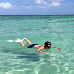 Caribbean Holidays, Solo Holidays June, Solo traveller swimming and snorkelling in clear Caribbean water near Punta Cana, Dominican Republic
