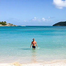Caribbean Holidays, Solo Holidays, Lone traveller swimming and snorkelling in clear turquoise water at a secluded Caribbean beach on Saint Martin