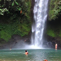 Caribbean Holidays, Trinidad Adventure Holidays, Visitors swimming beneath a tropical waterfall in Trinidad, with forest rocks, clear water and dense green vegetation