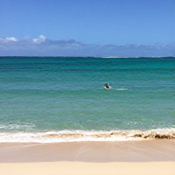 Caribbean Holidays, Trinidad January Holidays, Quiet Caribbean beach in Tobago with turquoise water, golden sand and a lone visitor swimming