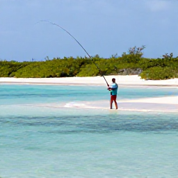 Caribbean Holidays, Turks and Caicos Fishing, An angler casting from a shallow turquoise flat in Turks and Caicos, with mangroves and pale sand visible beneath the water