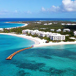 Caribbean Holidays, Turks Caicos February, Aerial view of the turquoise waters, white sands and luxury resorts of the Turks and Caicos Islands in bright February sunshine
