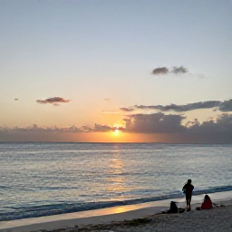 Caribbean Holidays, Turks Caicos February, Relaxed sunset on a Turks and Caicos beach in February, calm sea, soft evening light and travellers enjoying a peaceful shoreline