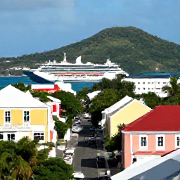 Caribbean Holidays, US Virgin Islands All Inclusive, Colourful Caribbean streets and waterfront buildings in Charlotte Amalie, St Thomas, with a cruise ship and green hills in the background
