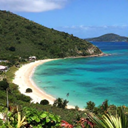 Caribbean Holidays, US Virgin Islands Beaches, Magens Bay on St Thomas viewed from above, with crescent-shaped sand, calm turquoise water and lush green slopes
