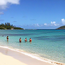 Caribbean Holidays, US Virgin Islands Beaches, Visitors swimming and snorkelling in clear shallow water beside a quiet sandy beach on St John, US Virgin Islands