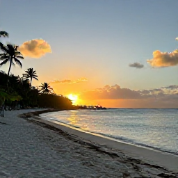 Caribbean Holidays, US Virgin Islands Tours, Warm December sunset over a white-sand beach in the United States Virgin Islands, with calm turquoise water and palm trees