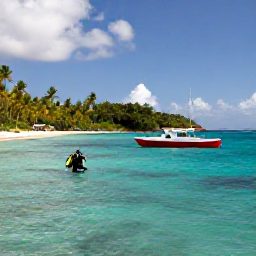 Caribbean Holidays, USVI Scuba Diving, Dive boat approaching a sheltered tropical bay with palm-fringed beaches and clear water near St Thomas, United States Virgin Islands