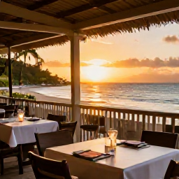 Caribbean Holidays, Virgin Islands Beaches, An outdoor Caribbean restaurant overlooking a sunset beach in the United States Virgin Islands, tables set for dinner and warm evening light