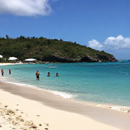 Caribbean Holidays, Virgin Islands July, Turquoise Caribbean water, white sand beach and snorkellers near Magens Bay on Saint Thomas in warm July weather