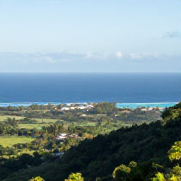 Caribbean Holidays, Volcano Trails, Panoramic view from a Caribbean volcanic ridge over rainforest, turquoise sea and a small coastal village, clear morning light